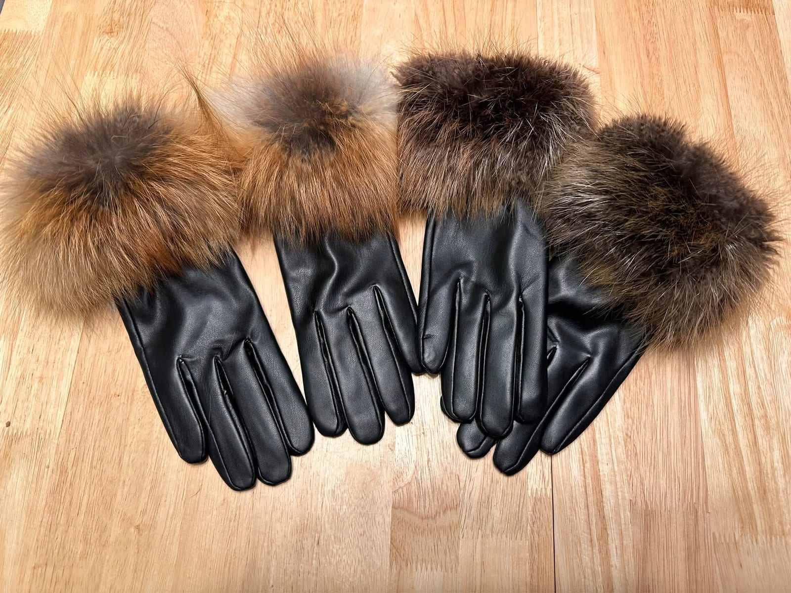 Black leather gloves with coyote fur cuffs
