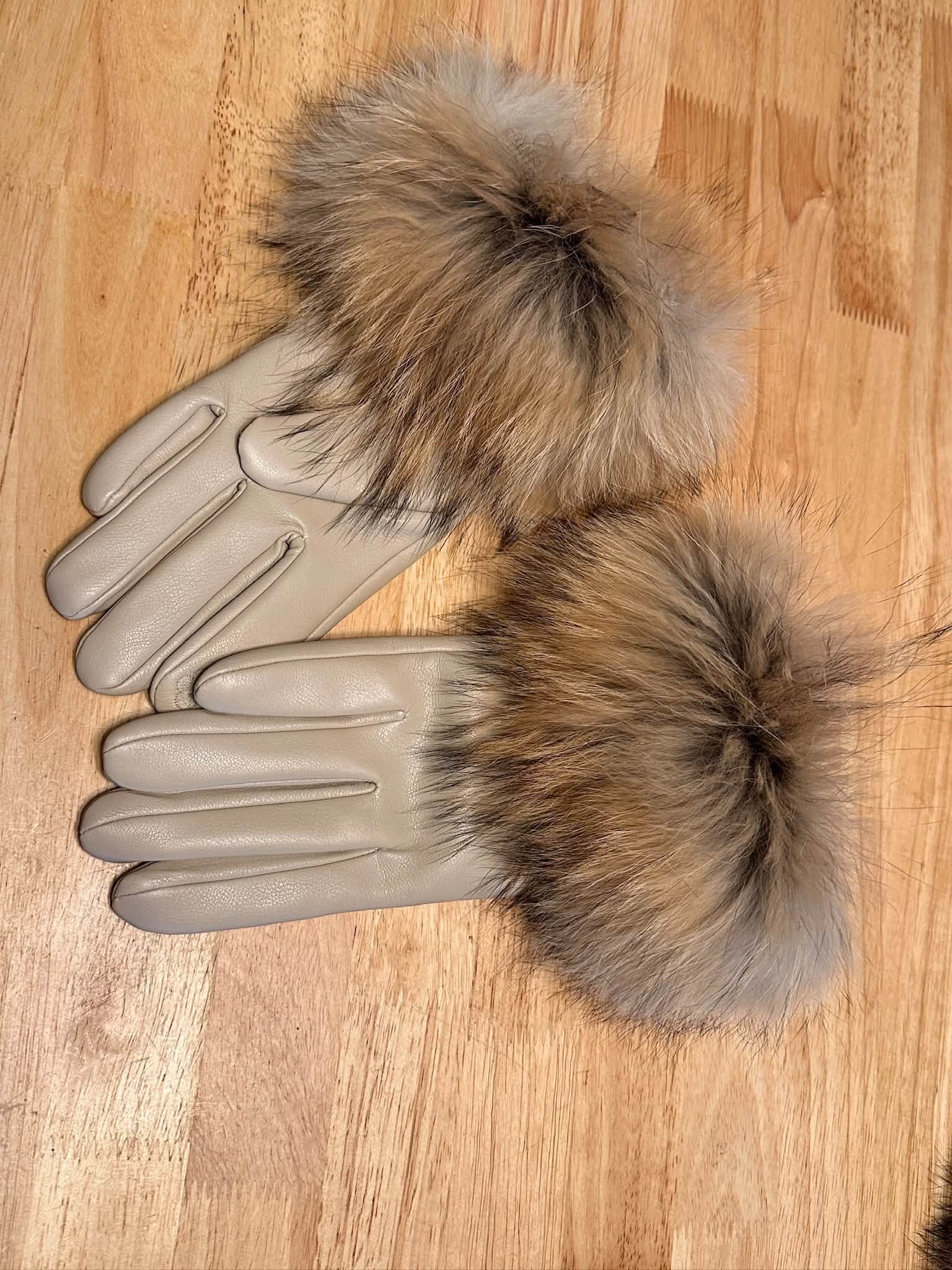 Light gray leather gloves with coyote fur cuffs